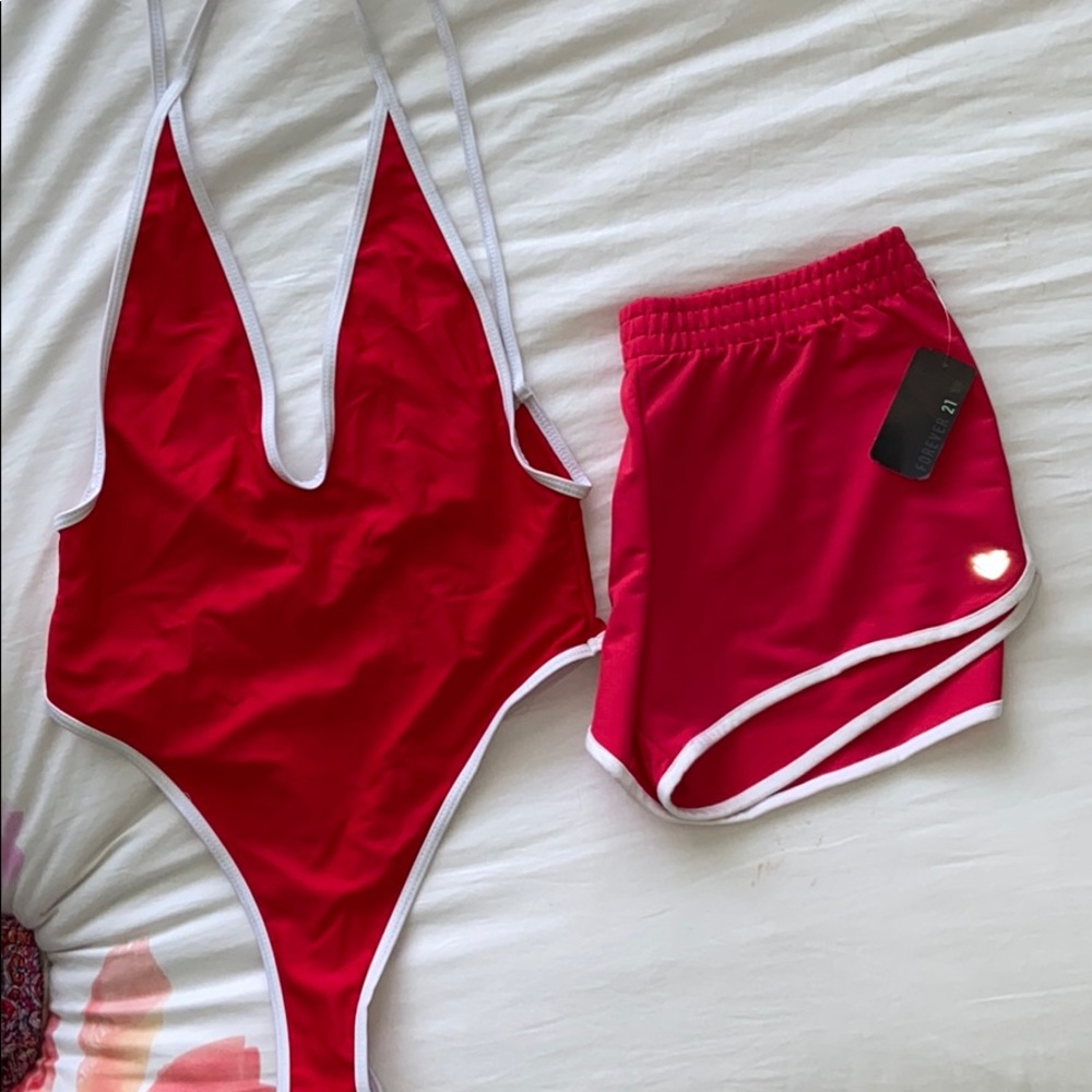 Red one piece and red shorts combo
